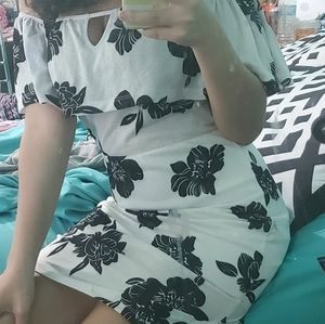 Off the shoulder bodycon floral print dress.